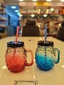 كوب زجاجي مضلع الوان بيد و شفاط 500 ملي